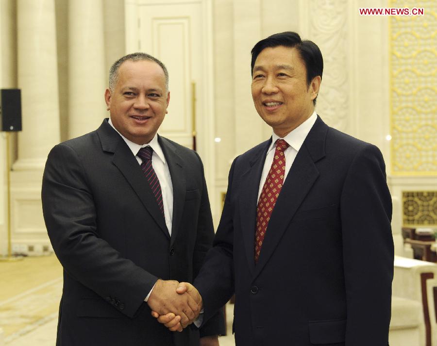 Chinese Vice President Li Yuanchao (R) meets with Venezuelan National Assembly President Diosdado Cabello, who is also the first vice president of the ruling United Socialist Party of Venezuela (PSUV), in Beijing, capital of China, July 9, 2013. (Xinhua/Rao Aimin)