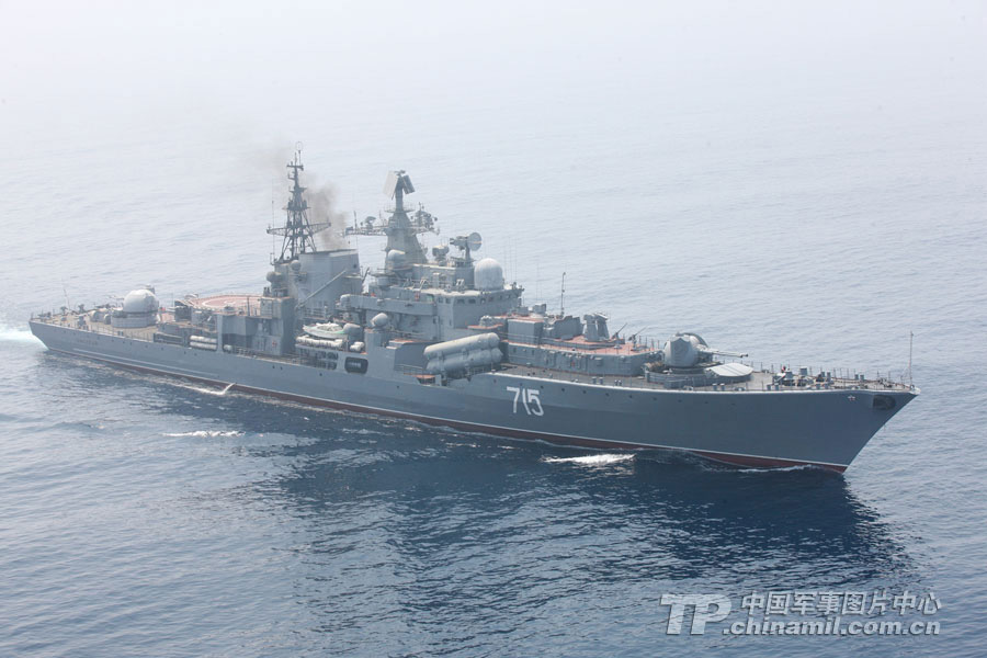 Chinese and Russian warships participating in the China-Russia "Joint Sea-2013" joint naval drill conduct joint escort drill in a designated exercise sea area on July 9, 2013. (China Military Online/Sun Yang) 