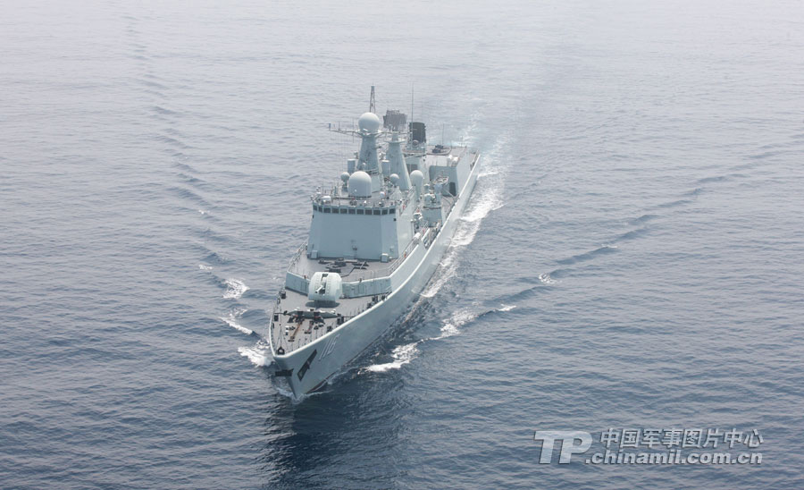 Chinese and Russian warships participating in the China-Russia "Joint Sea-2013" joint naval drill conduct joint escort drill in a designated exercise sea area on July 9, 2013. (China Military Online/Sun Yang) 