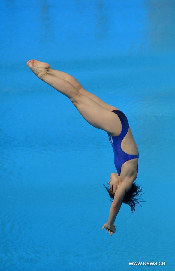 Zheng Shuangxue of China competes during the final of women's 3m Spingboard diving at the 27th Summer Universiade in Kazan, Russia, July 10, 2013. Zheng Shuangxue won the gold medal with 329.25. (Xinhua/Kong Hui)