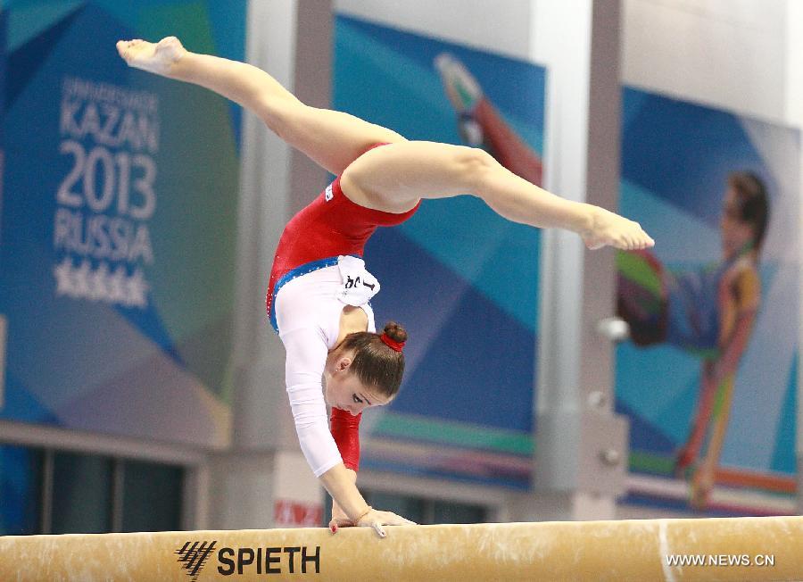 Aliya Mustafina of Russia competes during the women's balance beam final at the 27th Summer Universiade in Kazan, Russia, July 10, 2013. Mustafina won the silver medal with 14.525 points. (Xinhua/Ren Yuan)