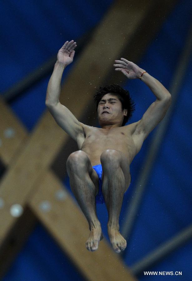Huo Liang of China competes during the final of men's 10m platform diving at the 27th Summer Universiade in Kazan, Russia, July 10, 2013. Huo Liang won the gold medal with 531.25. (Xinhua/Kong Hui)