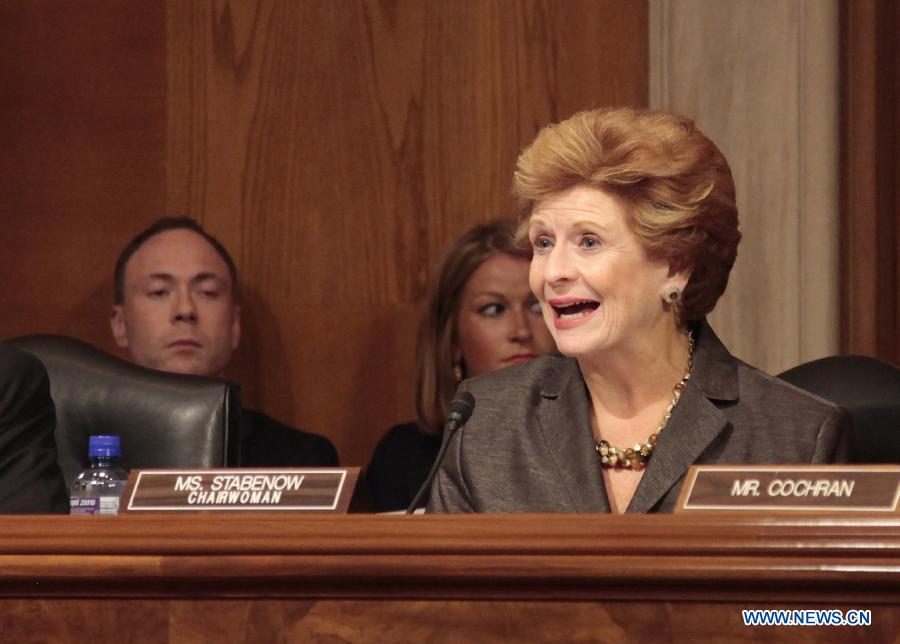 Chairwoman of the Senate Committee on Agriculture, Nutrition and Forestry Debbie Stabenow hosts a hearing on the purchase of Smithfield in Washington, the United States, July 10, 2013. Smithfield Foods CEO Larry Pope on Wednesday tried to relieve senators' concerns over Chinese Shuanghui International Holdings Ltd.'s purchase of his company. (Xinhua/Wang Zongkai)