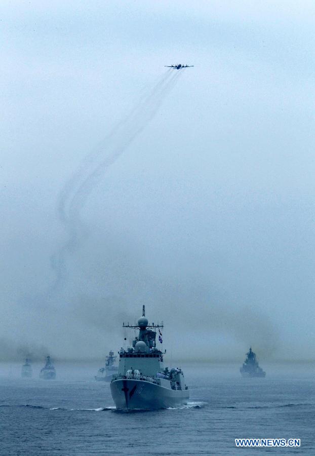 Chinese and Russian naval vessels are seen during a military review of the "Joint Sea-2013" drill at Peter the Great Bay in Russia, July 10, 2013. The "Joint Sea-2013" drill participated by Chinese and Russian warships concluded here on Wednesday. (Xinhua/Zha Chunming)