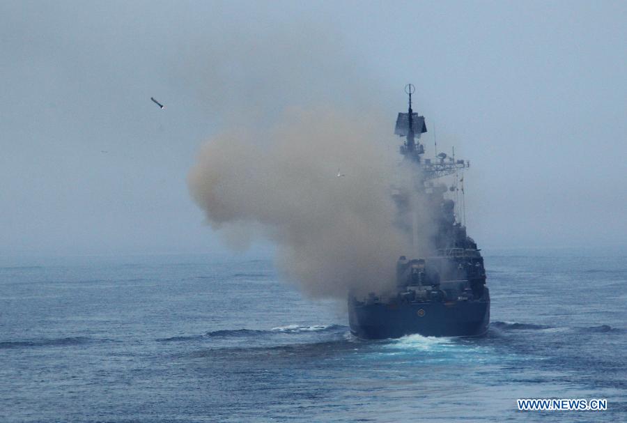 Russian naval vessel fire anti-submarine missile during the "Joint Sea-2013" drill at Peter the Great Bay in Russia, July 10, 2013. The "Joint Sea-2013" drill participated by Chinese and Russian warships concluded here on Wednesday. (Xinhua/Zha Chunming)