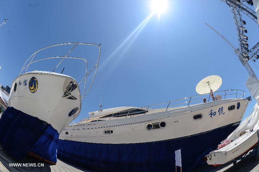 Photo taken on July 11, 2013 shows the boats presented in the 2013 China (Zhoushan archipelago) International Boat Show in the Putuo District of Zhoushan City, east China's Zhejiang Province. The show kicked off on Thursday. (Xinhua/Xu Yu)