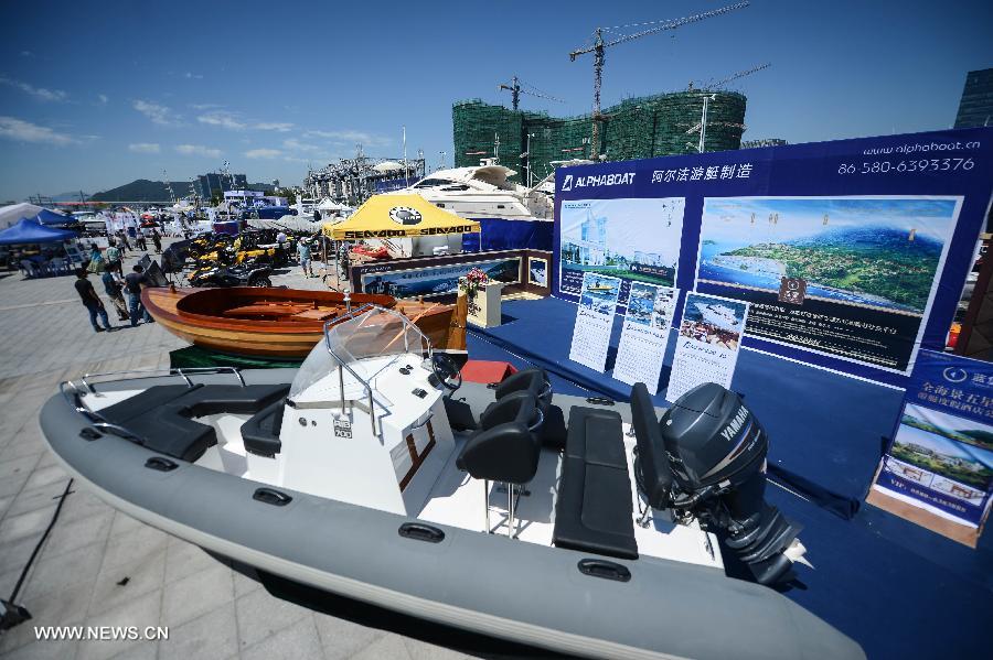 Various types of boats are presented in the 2013 China (Zhoushan archipelago) International Boat Show in the Putuo District of Zhoushan City, east China's Zhejiang Province, July 11, 2013. The show kicked off on Thursday. (Xinhua/Xu Yu)