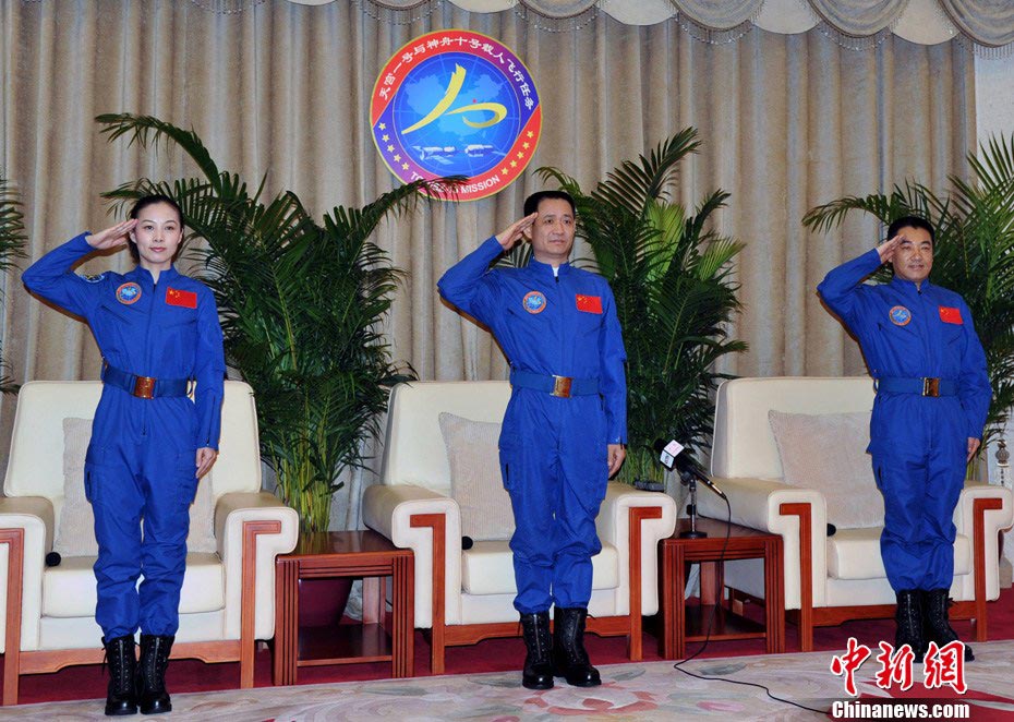 Tree astronauts of China’s Shenzhou-10 manned space mission - Nie Haisheng (M), Zhang Xiaoguang (R) and Wang Yaping - are discharged from quarantines on July 11. They are in good conditions and met the press at the space city in Beijing. (Chinanews.com/ Sun Zifa)