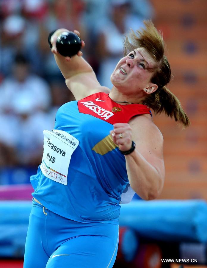 Irina Tarasova of Russia competes during the women's shot put final at the 27th Summer Universiade in Kazan, Russia, July 11, 2013. Tarasova won the gold medal with 18.75 meters. (Xinhua/Meng Yongmin) 
