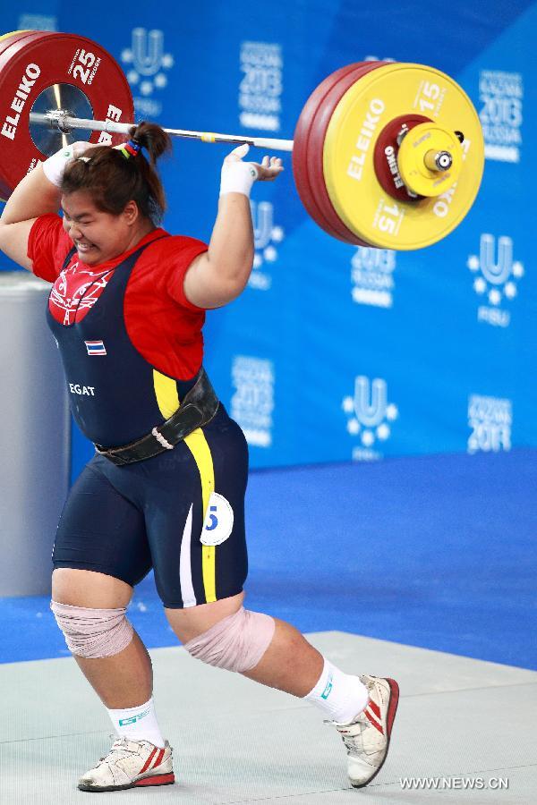 Chitchanok Pulsabsakul of Thailand competes during the women's +75kg weightlifting competition at the 27th Summer Universiade in Kazan, Russia, July 11, 2013. Chitchanok Pulsabsakul won the silver medal with a weight of 278kg. (Xinhua/Ren Yuan) 