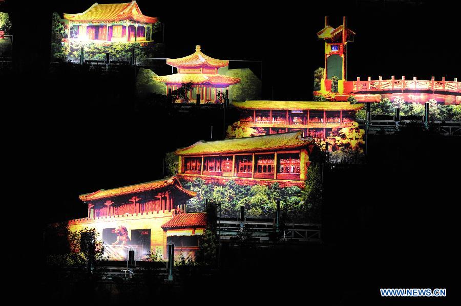 Kangxi ceremony is performed in Chengde, north China's Hebei Province, July 11, 2013. The show depicts the stories of Kangxi (1654-1722), the fourth emperor of ancient China's Qing Dynasty (1644-1911). During the reign of Kangxi, China witnessed a strong and prosperous period. Kangxi ceremony has run for 218 performances and has drwan nearly 200,000 viewers since its premiere in June 2011. (Xinhua/Wang Min)