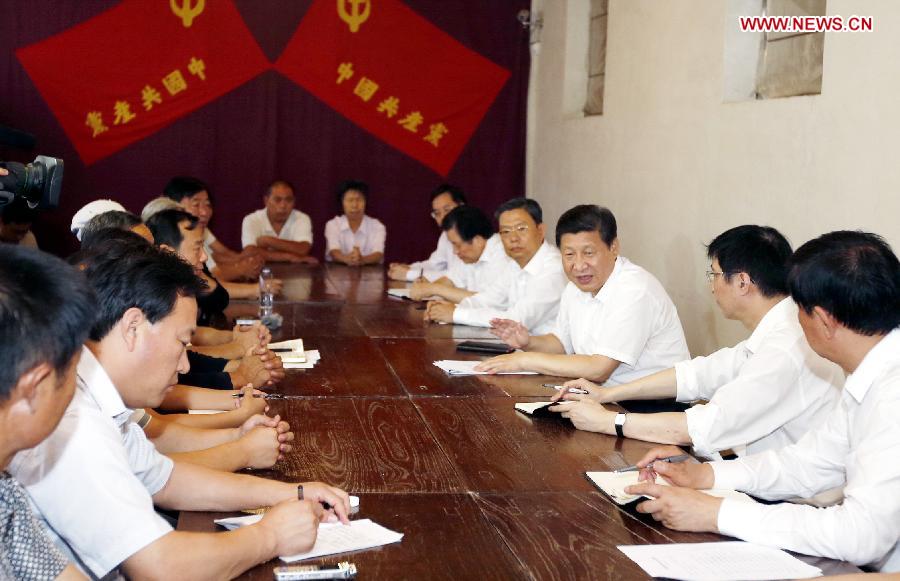 Chinese President Xi Jinping (3rd R) holds a discussion meeting with local cadres and representatives of the public at Xibaipo, an old revolutionary base in Pingshan County, north China's Hebei Province. Xi made an inspection tour of Hebei Province from July 11 to July 12. (Xinhua/Ju Peng)
