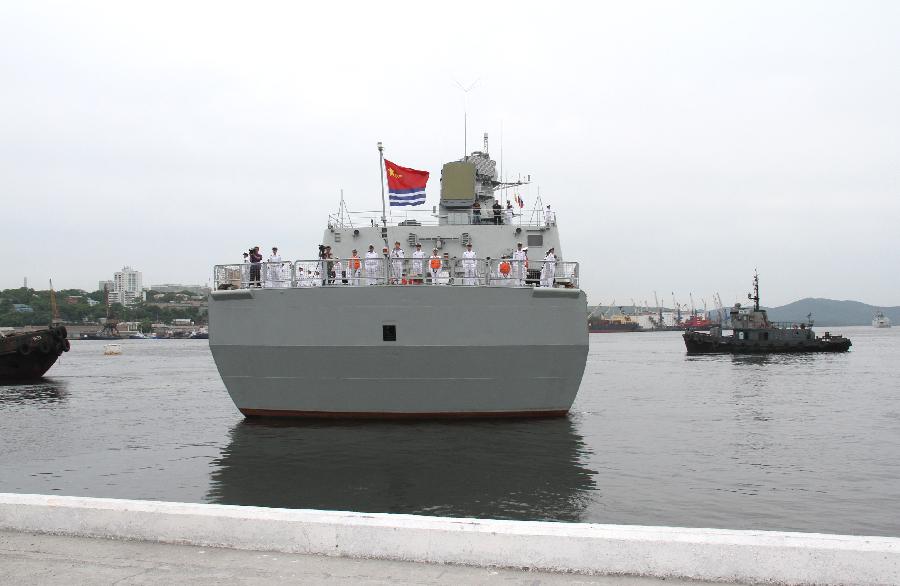 Destroyer Shenyang of the ChinesePeople's Liberation Army(PLA) Navy leaves the Pier of Golden Horn Bay inRussia, on July 12, 2013. Seven Chinese warships left Russia's far eastern port of Vladivostok Friday morning after taking part in a joint naval drill with Russia. (Xinhua/Wang Jingguo)