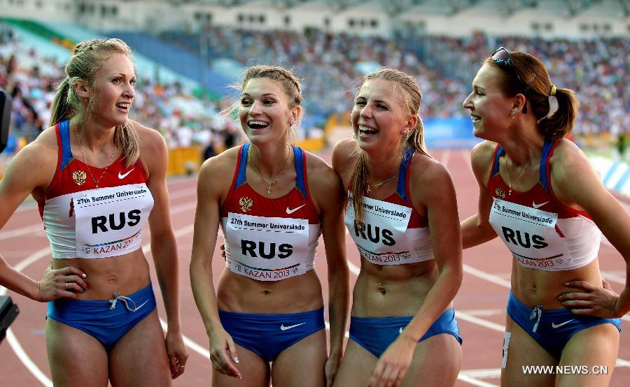 Athletes of Russia celebrate after the women's 4x400 relay final at the 27th Summer Universiade in Kazan, Russia, July 12, 2013. Team Russia won the gold with 3 minutes and 26.61 seconds. (Xinhua/Li Ying)