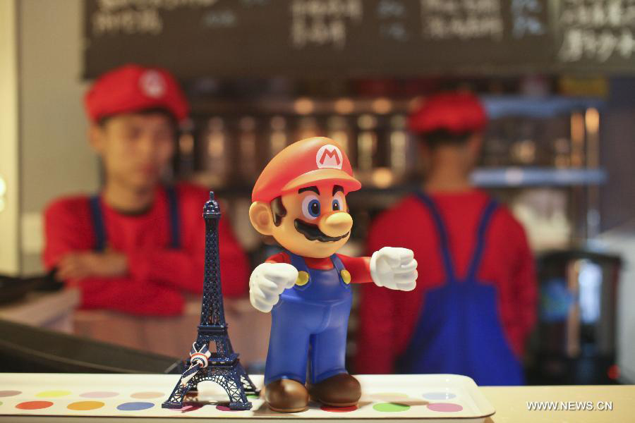 1. Super Mario themed Restaurant, TianjinWaiters in the costume of Super Mario, a famous video game character, work at a Mario themed restaurant in Tianjin, north China, April 8, 2013. The restaurant that opened on April 8,2013 attracted many young customers due to its "Mario-like" waiters and various decorations. (Source: China.org.cn/Xinhua file photo)