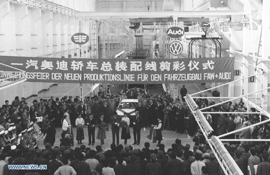 File photo taken on April 21, 1990 shows the ribbon-cutting ceremony for the operation of the new assembling line of producing Audi cars by the First Automotive Works Group (FAW) and Audi in China.  (Xinhua)
