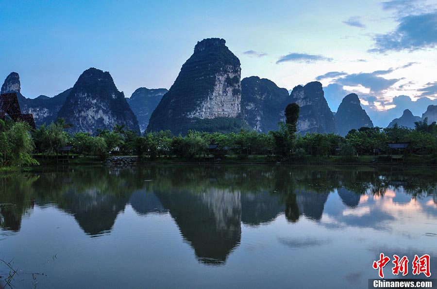 Photo taken on July 13, 2013 shows the beautiful karst mountains in Chongzuo, Guangxi Zhuang Autonomous Region. (CNS/Zhang Qi)