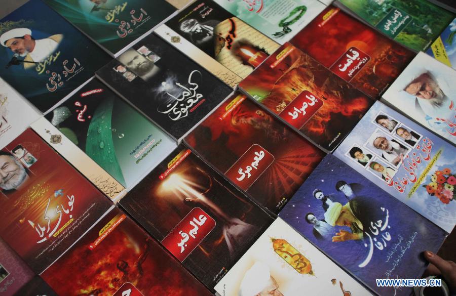 Books are seen at a book exhibition in Kabul, capital of Afghanistan, on July 15, 2013. A 10-day book exhibition kicked off in Kabul to mark the start of Ramadan or Muslim holy month of fasting which began on July 10. (Xinhua/Ahmad Massoud)