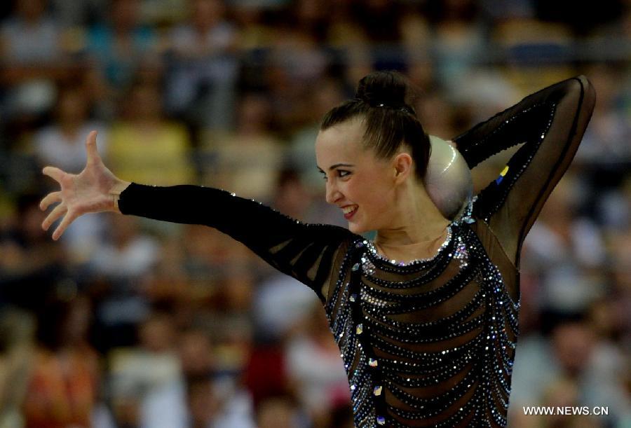 Ganna Rizatdinova of Ukraine competes during Women's Individual Ball final of Gymnastics Rhythmic at the 27th Summer Universiade in Kazan, Russia, July 16, 2013. Rizatdinova won the bronze with 17.800. (Xinhua/Kong Hui)