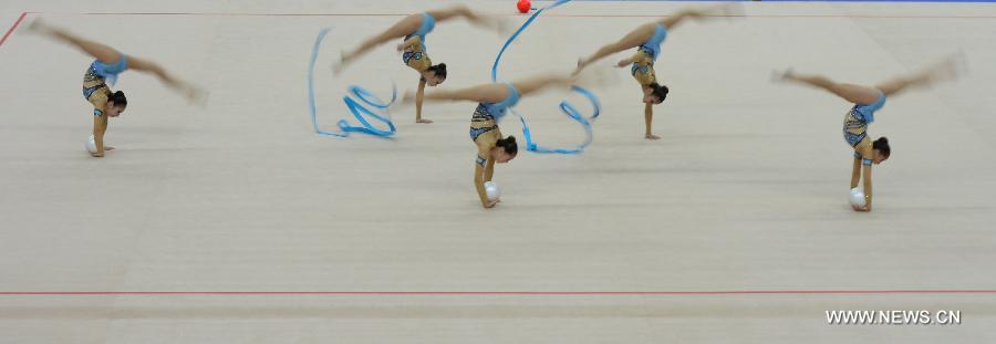 Athletes of Japan compete during Group Apparatus 3+2 final of Gymnastics Rhythmic at the 27th Summer Universiade in Kazan, Russia, July 16, 2013. Japan got the silver with 16.866 points. (Xinhua/Kong Hui)