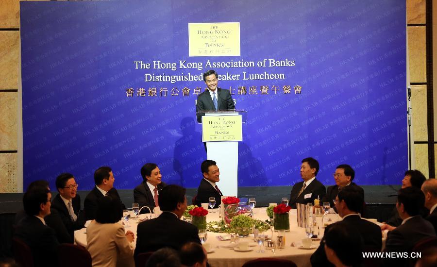 Hong Kong Chief Executive C Y Leung addresses a luncheon held by the Hong Kong Association of Banks in south China's Hong Kong, July 17, 2013. Leung said despite the global financial crisis, Hong Kong's banking sector continues to be the driving force in deepening, expanding and diversifying financial services in the city. (Xinhua/Li Peng)