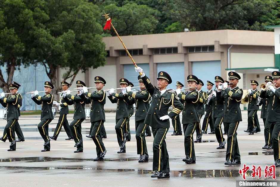 The opening ceremony of the 9th "Hong Kong Youth Military Summer Camp" is held at the San Wai Barracks of the Chinese People's Liberation Army (PLA) Garrison in the Hong Kong Special Administrative Region (HKSAR) on the morning of July 15, 2013. A total of 260 students from 143 middle schools joined the camp. (Chinanews/Hong Shaocai)
