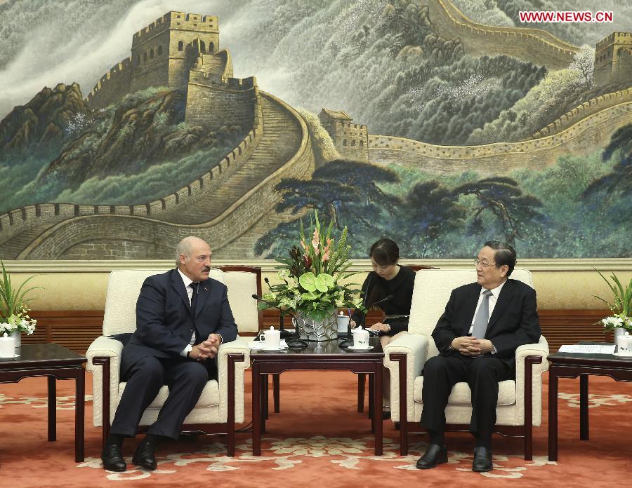 Yu Zhengsheng (R), chairman of the National Committee of the Chinese People's Political Consultative Conference (CPPCC), meets with Belarusian President Alexander Lukashenko at the Great Hall of the People in Beijing, capital of China, July 17, 2013. (Xinhua/Pang Xinglei)