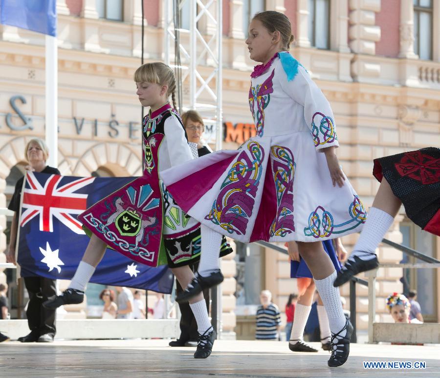 Participants from Australia perform during the 47th International Folklore Festival in Zagreb, capital of Croatia, on July 18, 2013. Around 900 participants of 29 art groups from Croatia and 11 other countries and regions took part in the five-day traditional festival. (Xinhua/Miso Lisanin)