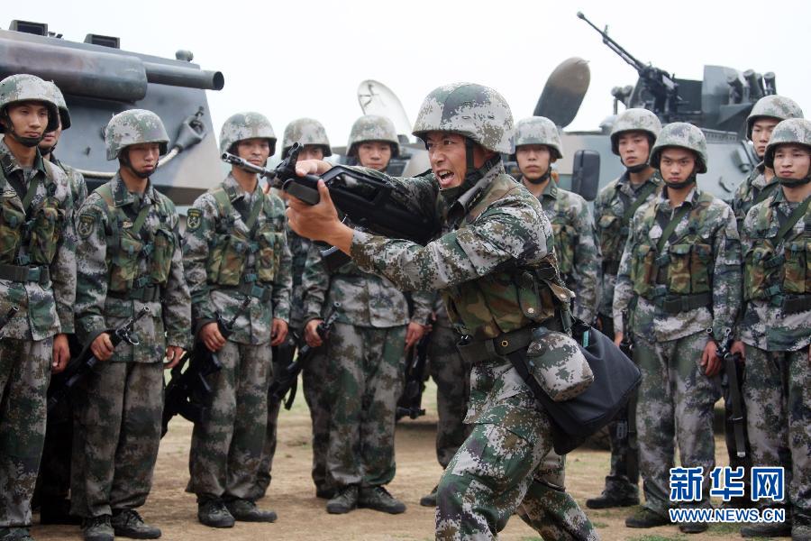 Chu Kewei, a college graduate-turned-commander, cherishes the dream to defend his country. [Photo/Xinhua] 