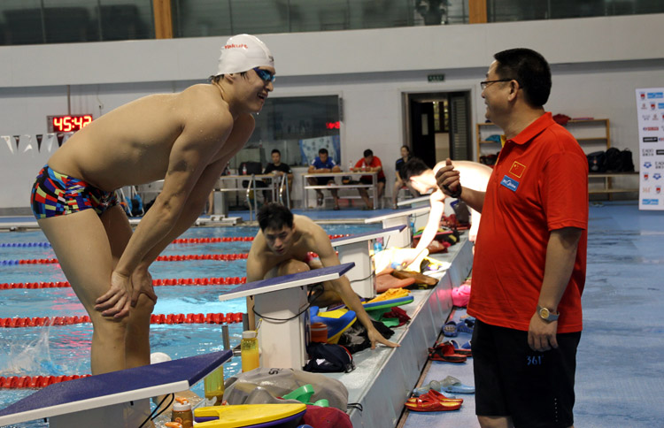 Sun Yang trains with national swimming team on July 16, 2013. Zhang Yadong is the temporary coach. (Photo /Osports)