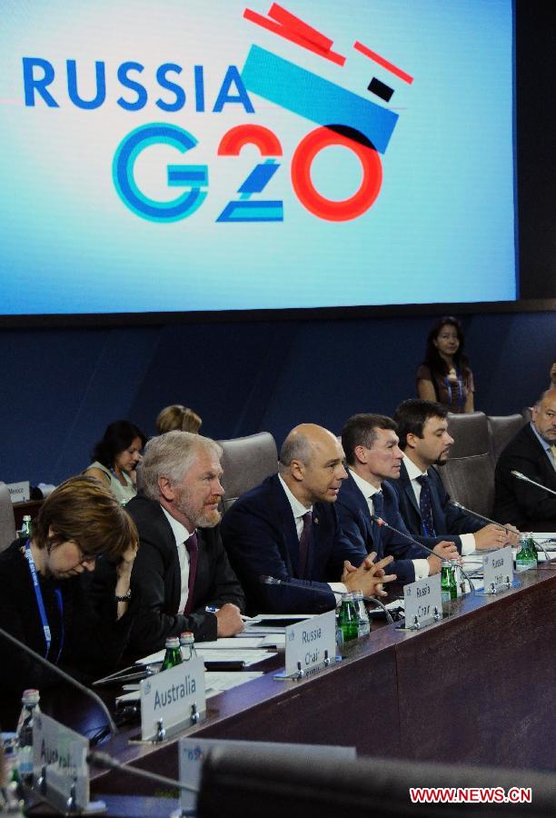 Russian Finance Minister Anton Siluanov (3rd L) speaks on the Group of Twenty (G20) Finance and Labor Ministers Meeting of G20 finance ministers and central bank governors' meetings in Moscow, Russia, July 19, 2013. The G20 finance ministers and central bank governors' meetings kicked off in Moscow on Friday (Xinhua/Ding Yuan)