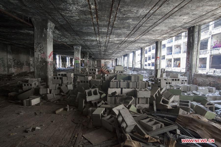 Photo taken on July 19, 2013 shows the Packard Plant, an abandoned auto factory, in Detroit, midwest city of the United States. U.S. city Detroit filed for bankruptcy Thursday, making it the largest-ever municipal bankruptcy in U.S. history, local media reported. (Xinhua/Marcus DiPaola)