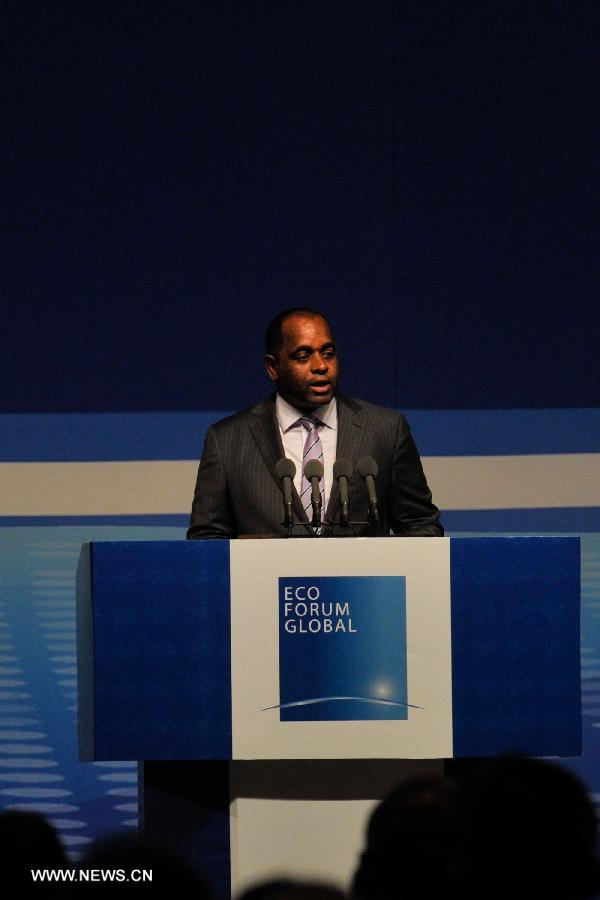 Dominican Prime Minister Roosevelt Skerrit addresses the opening ceremony of the Eco Forum Global Annual Conference Guiyang 2013 in Guiyang, capital of southwest China's Guizhou Province, July 20, 2013. Over 2,000 participants from home and abroad attended the conference themed on "Building Eco-Civilization: Green Transformation and Transition". (Xinhua/Ou Dongqu) 