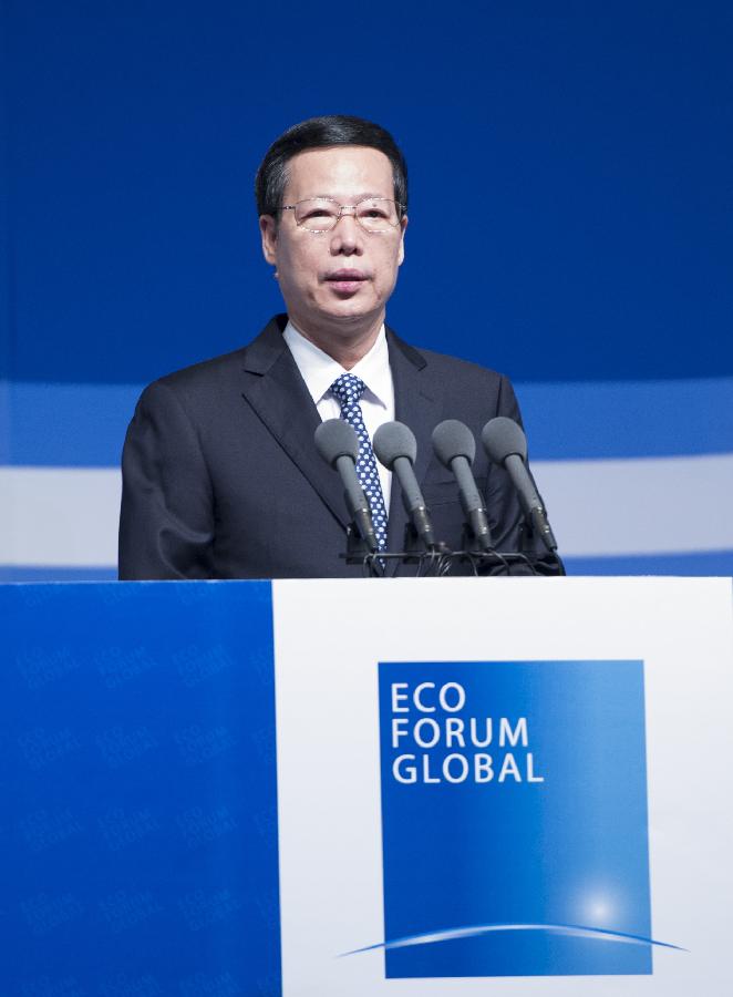 Chinese Vice Premier Zhang Gaoli, also a member of the Standing Committee of the Political Bureau of the Communist Party of China Central Committee, addresses the opening ceremony of the Eco Forum Global Annual Conference 2013 in Guiyang, capital of southwest China's Guizhou Province, July 20, 2013. Zhang read out Chinese President Xi Jinping's congratulatory letter on the opening of the conference and delivered a speech here on Saturday. (Xinhua/Wang Ye) 