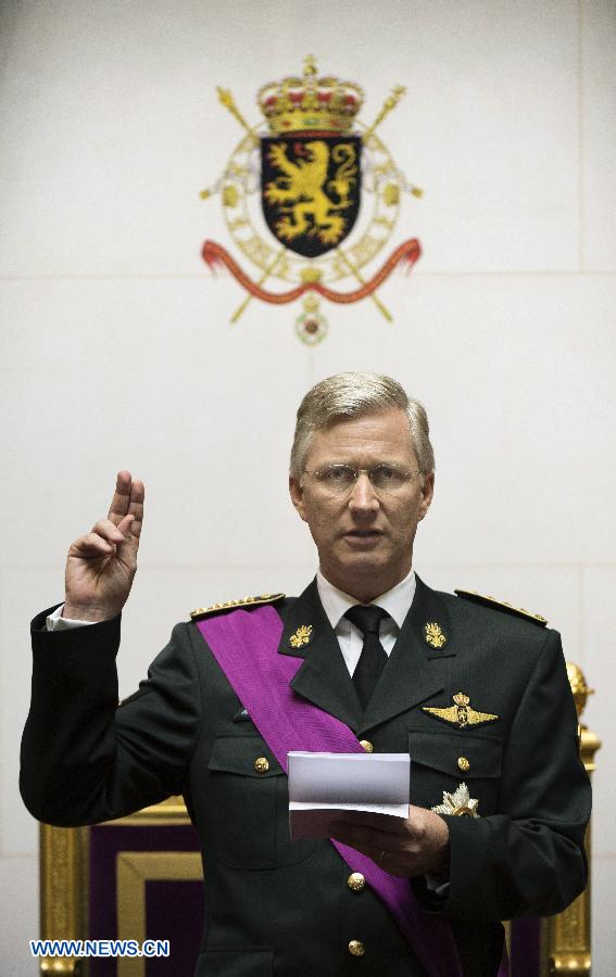 King Philippe of Belgium takes the oath during a ceremony at the Belgian Parliament in Brussels, on July 21, 2013. Prince Philippe was sworn in before parliament as Belgium's seventh king on Sunday, the country's national day, after his 79-year-old father Albert II abdicated. (Xinhua/POOL)