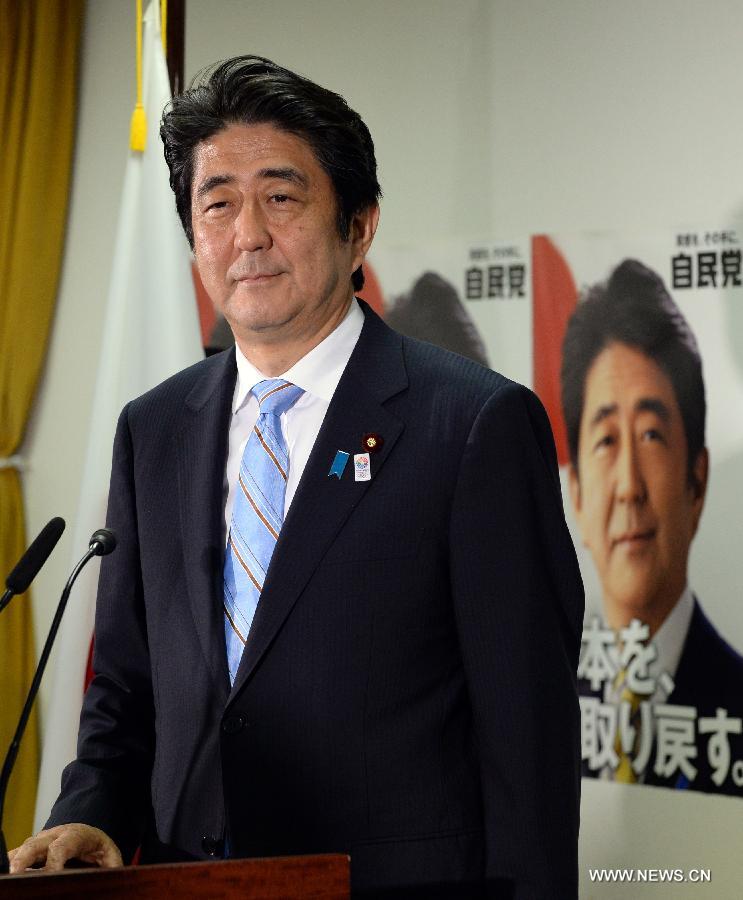Japanese Prime Minister and ruling Liberal Democratic Party (LDP) leader Shinzo Abe attends a press conference at the LDP headquarters in Tokyo, Japan, July 22, 2013. (Xinhua/Ma Ping) 