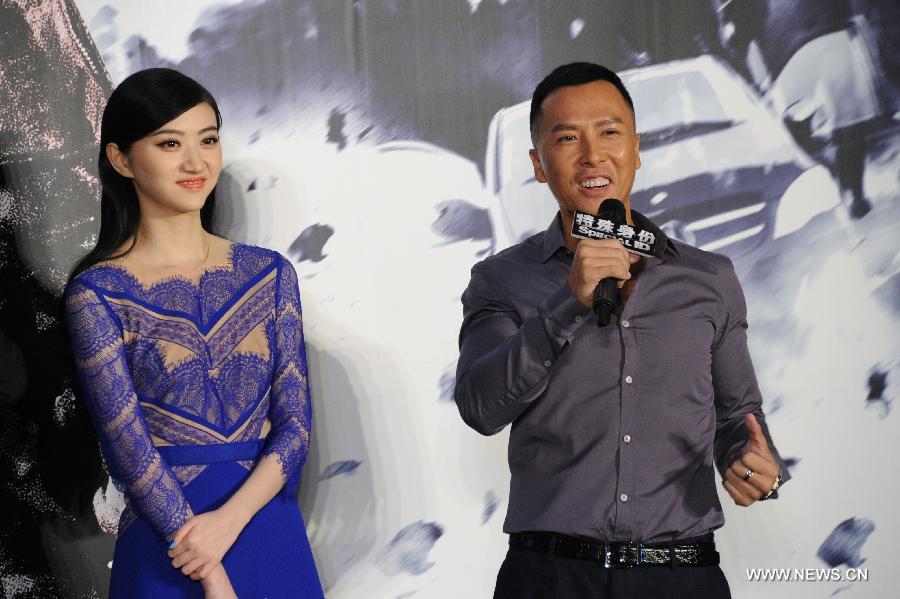 Actress Jing Tian (L) and actor Donnie Yen are interviewed during the press conference of the movie "Special Identity" in Beijing, capital of China, July 22, 2013. The movie "Special Identity" will be screened in October. (Xinhua)