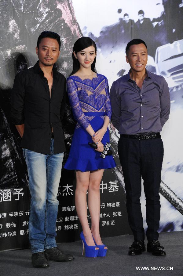 Actor Zhang Hanyu (L), actress Jing Tian (M) and actor Donnie Yen (R) attend the press conference of the movie "Special Identity" in Beijing, capital of China, July 22, 2013. The movie "Special Identity" will be screened in October. (Xinhua)