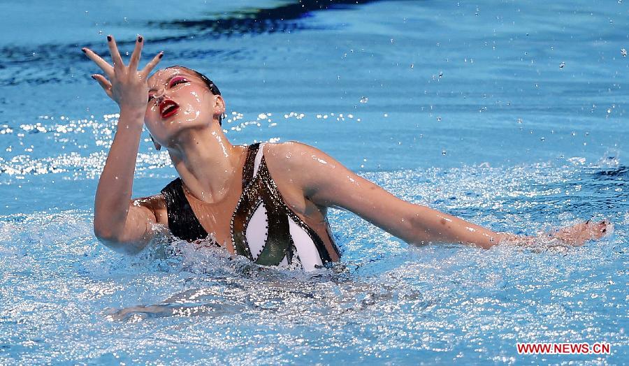 Huang Xuechen of China competes in the Solo Preliminaries of the Synchronised Swimming competition in the 15th FINA World Championships at Palau Sant Jordi in Barcelona, Spain, on July 22, 2013. Huang advanced to the final with a total score of 95.280 points.(Xinhua/Wang Lili) 