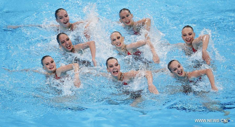 Team Russia competes in the Team Technical Finals of the Synchronised Swimming competition in the 15th FINA World Championships at Palau Sant Jordi in Barcelona, Spain, on July 22, 2013. Team Russia claimed the title with a total score of 96.600 points. (Xinhua/Wang Lili)