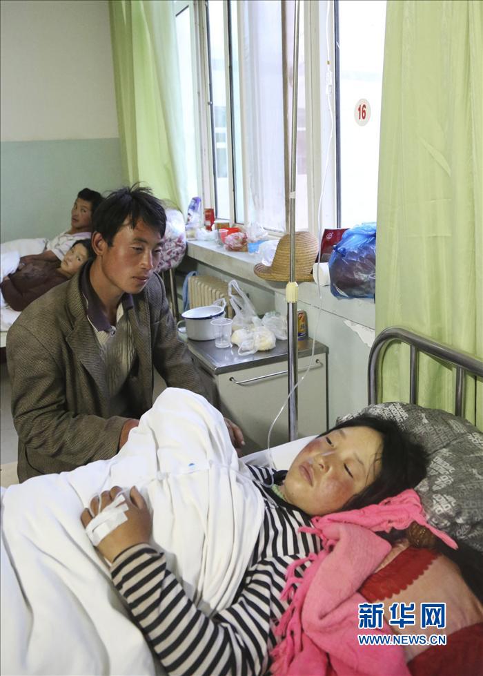 The photo taken on July 23, 2013, shows the first baby born in the quake-hit Minxian County, northwest China’s Gansu province. Jiang Yafei, gave birth to a baby at a temporary tent in Minxian county, at 10:30 p.m. on Monday. The arrival of new life came only hours after a 6.6-magnitude earthquake jolted the border of Minxian and Zhangxian counties in Gansu.  As of 6 p.m. on Monday, 89 people had been confirmed dead and 515 injured. (Xinhua/Cao Zhengping) 