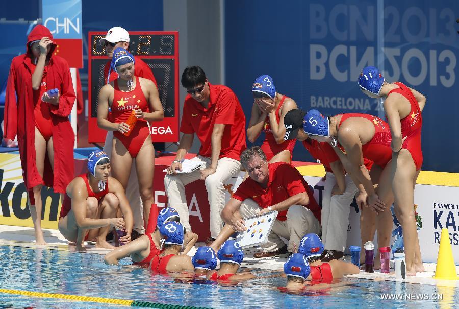Alexander Kleymenov (4th, R), head coach of team China instructs players during the Women's Waterpolo Group B Preliminary Round match between China and Australia in the 15th FINA World Championships at Palau Sant Jordi in Barcelona, Spain, on July 23, 2013. China lost 5-14. (Xinhua/Wang Lili) 
