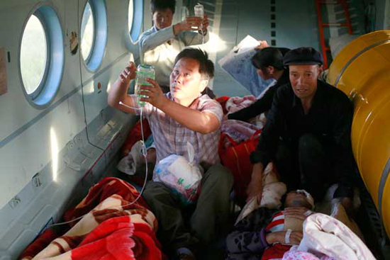 Patients transferred to Lanzhou as local hospitals fill