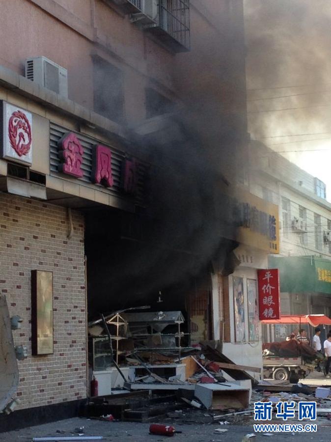 Eight people were injured in a gas explosion at a bakery Wednesday morning in downtown Beijing, local fire department confirmed. The explosion occurred at 7:33 a.m. in a Golden Phoenix Bakery store on Guangming Road, Dongcheng District. (Photo/Xinhua)