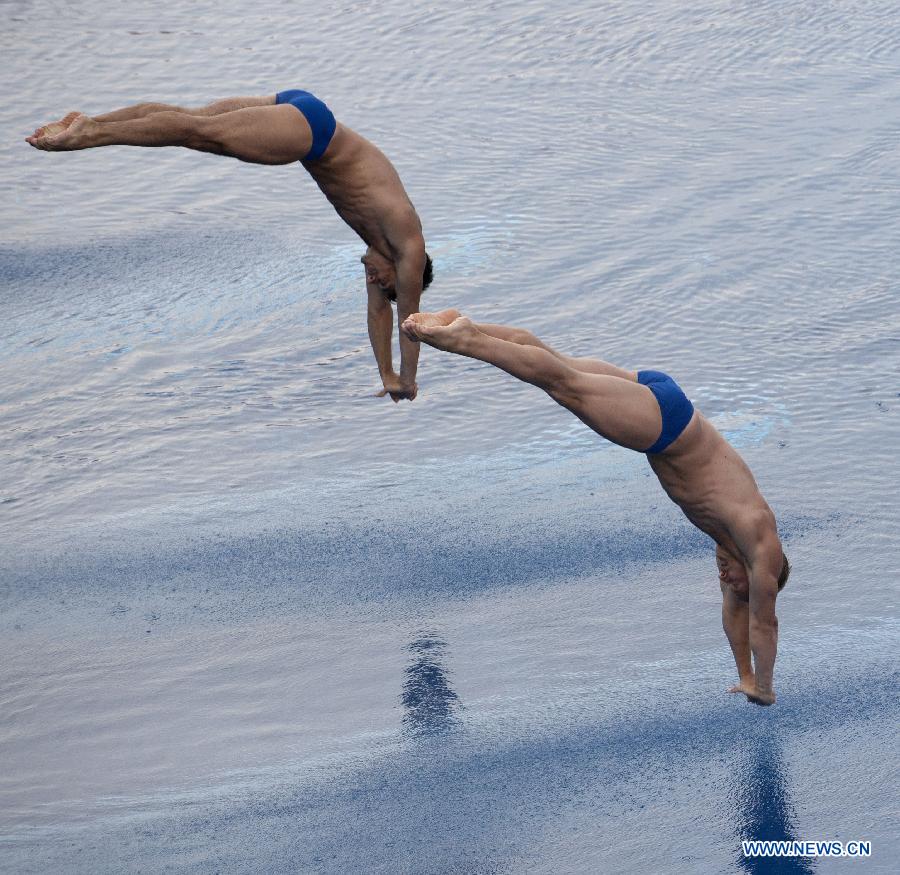 Chris Mears and Nicholas Robinson-Baker of Britain compete during the men's 3m synchro springboard final of the diving competition at the 15th FINA World Championships in Barcelona, Spain, on July 23, 2013. Chris Mears and Nicholas Robinson-Baker took the 8th place with a total score of 391.53 point. (Xinhua/Xie Haining)