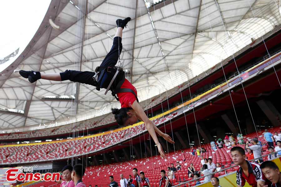 Attraction, a love story set in the future, incorporates stage elements from plays, dances, magic shows and acrobatics. The show will be staged at the Bird's Nest from September 12 to October 7, 2013. (CNS / Fu Tian)