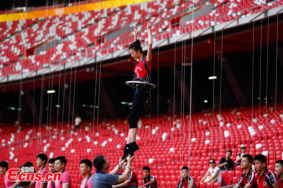 Attraction, a love story set in the future, incorporates stage elements from plays, dances, magic shows and acrobatics. The show will be staged at the Bird's Nest from September 12 to October 7, 2013. (CNS / Fu Tian)