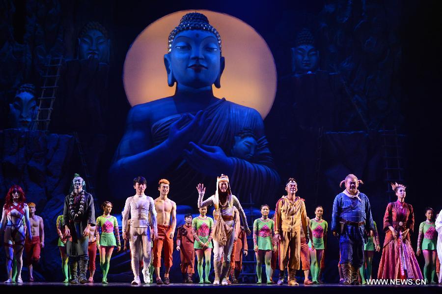 Actors of the acrobatic opera "Journey to the West" greet the audiance at Lincoln Center in New York, the United States on July 23, 2013. The opera, directed by overseas Chinese artist Chen Shizheng, was a fusion of Chines acrobatics, Kungfu, drama and animation. (Xinhua/Wang Lei)