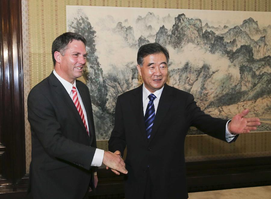 Chinese Vice Premier Wang Yang (R) meets with Australian Trade Minister Richard Marles in Beijing, capital of China, July 24, 2013. (Xinhua/Ding Lin)