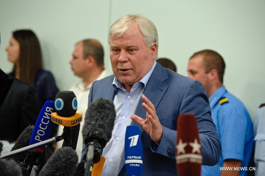 Lawyer Anatoly Kucherena speaks to the media after meeting with fugitive U.S. intelligence whistleblower Edward Snowden at the Sheremetyevo Airport in Moscow, Russia, on July 24, 2013. Snowden can not leave the transit zone of the Sheremetyevo Airport as he was not granted a document from Russia's Federal Migration Service, a lawyer on behalf of Snowden said Wednesday. (Xinhua/Jiang Kehong)